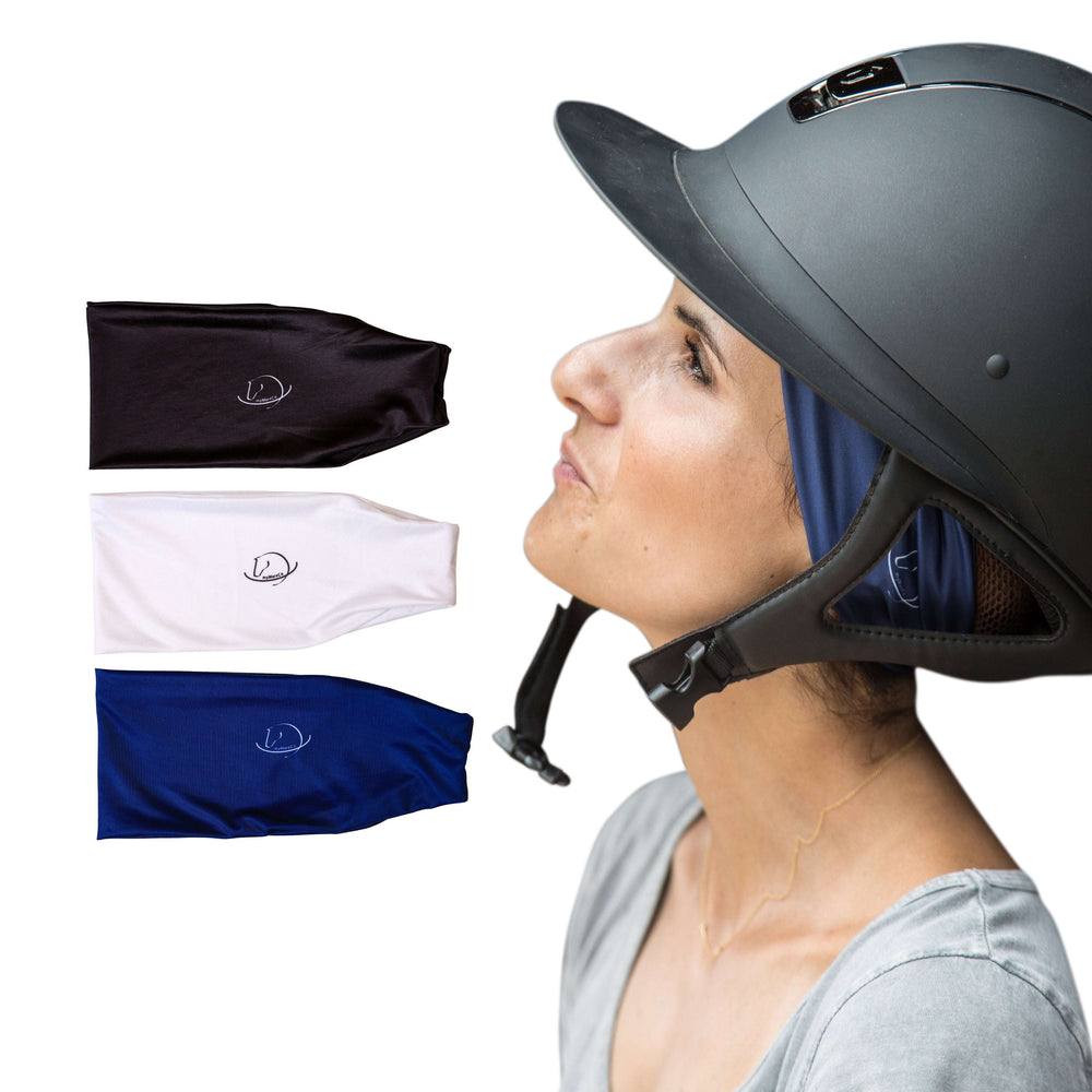 Woman wearing a navy under helmet headband with black, white, and navy color options displayed — breathable, no-slip sports headbands for equestrians.
